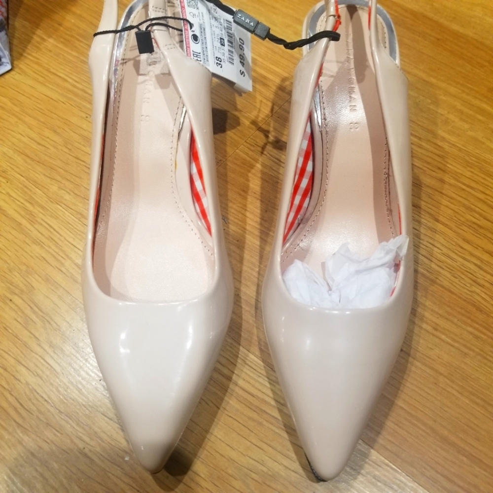 Blush tone  shoes Orange and white plaid on the inside.